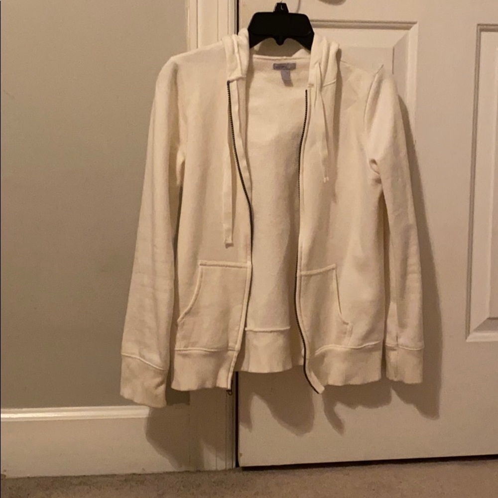 white zip up jacket